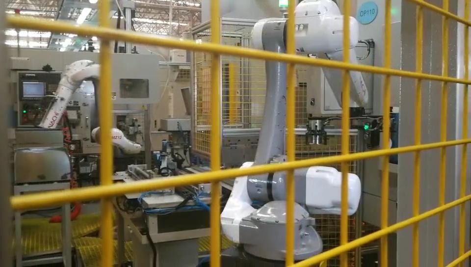 Multi-Process Robotic Machine-Tending Line