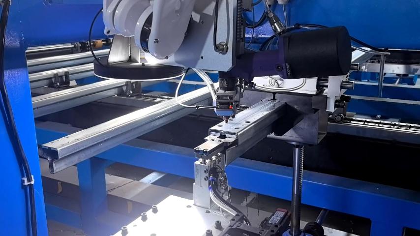 Robotic Riveting for Elevator Guide Rail Manufacturing